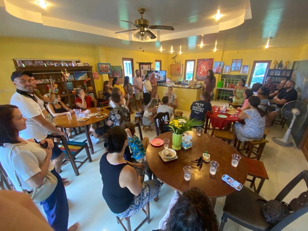 Parent speaking with a preschool teacher about their child at Shining Stars School Kamala in Phuket