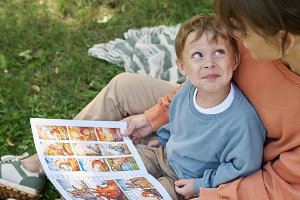 Parent and young child reading together and supporting early learning at home